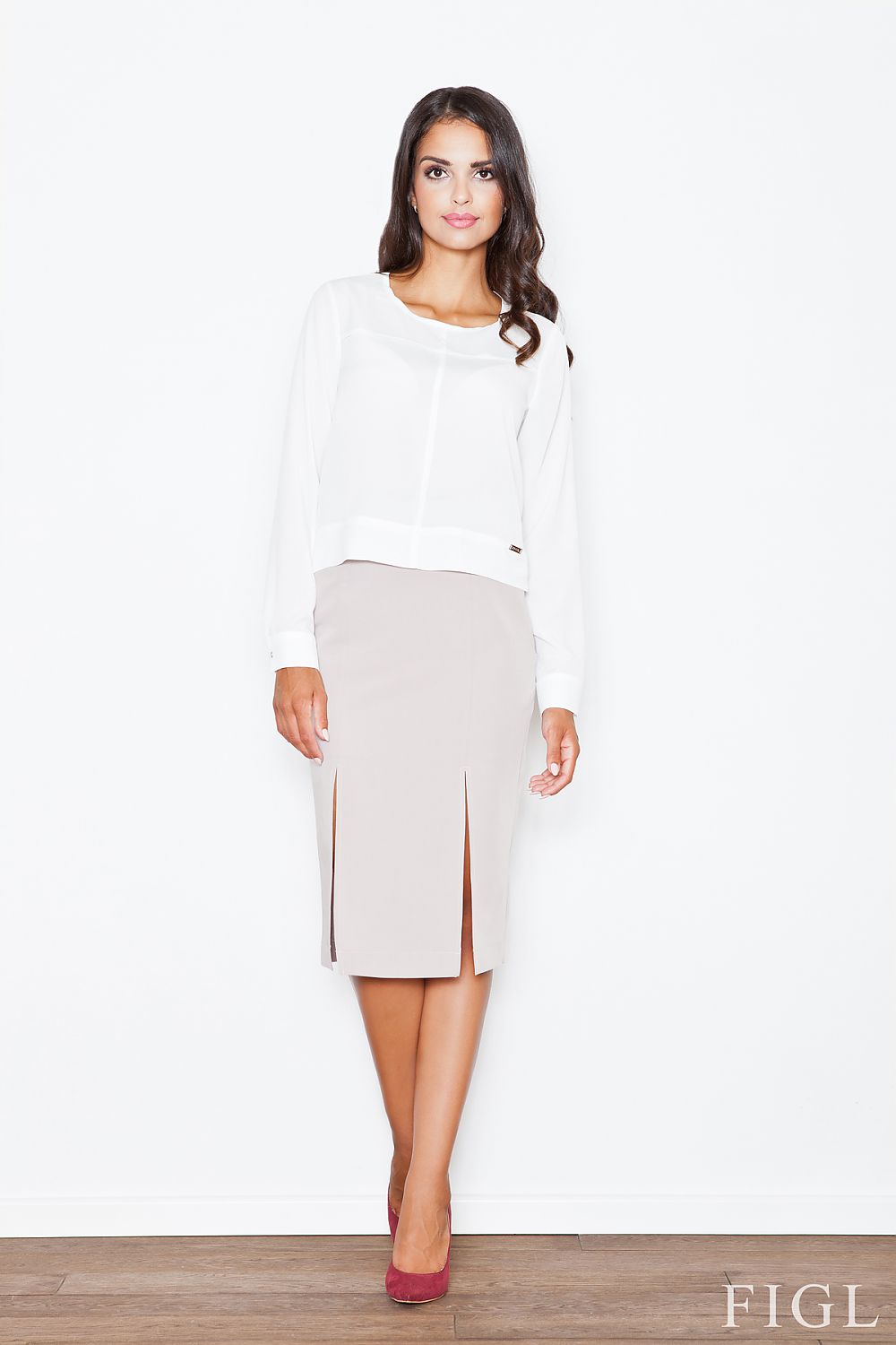 Jupe beige midi fendue droite élégante pour un look chic et professionnel, idéale pour le bureau ou les événements formels.