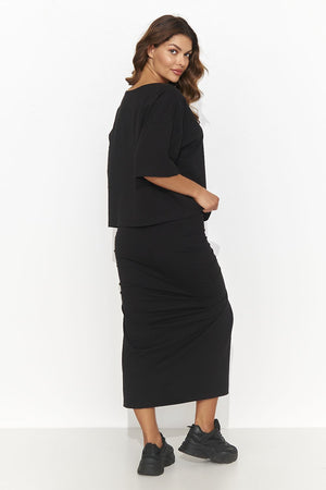 Jupe noire fendue midi élégante et moderne pour un look chic et tendance, disponible en ligne.