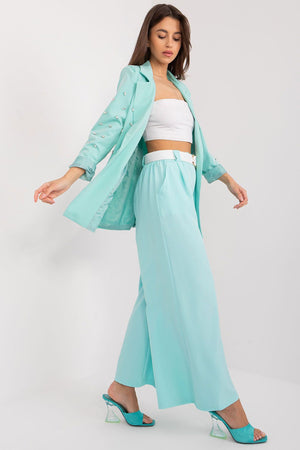 Jupe longue fluide verte avec ceinture blanche pour une allure élégante, idéale pour la collection femme Italy Moda.