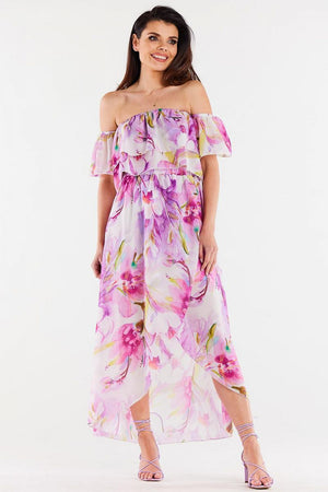 Jupe longue fluide à motifs floraux dans les tons rose pour un look bohème et féminin, parfaite pour la saison printanière ou estivale.