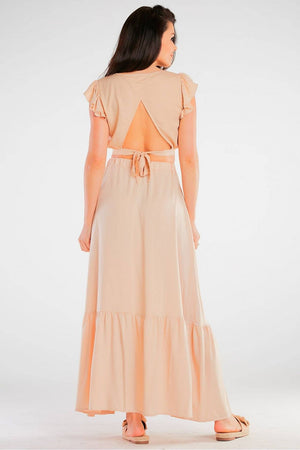 Jupe longue fluide couleur beige avec taille nouée et coupe décontractée, parfaite pour un style élégant et confortable.