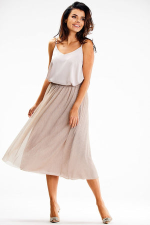 Jupe midi plissée beige en tulle légère pour un look élégant et féminin, idéale pour diverses occasions.