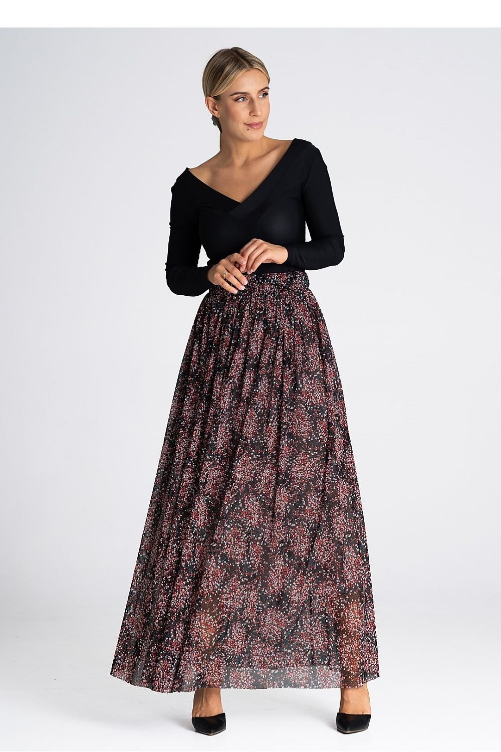 Jupe longue bohème chic en tulle à motif fleuri avec taille haute élastique et finitions élégantes pour un style féminin et tendance.