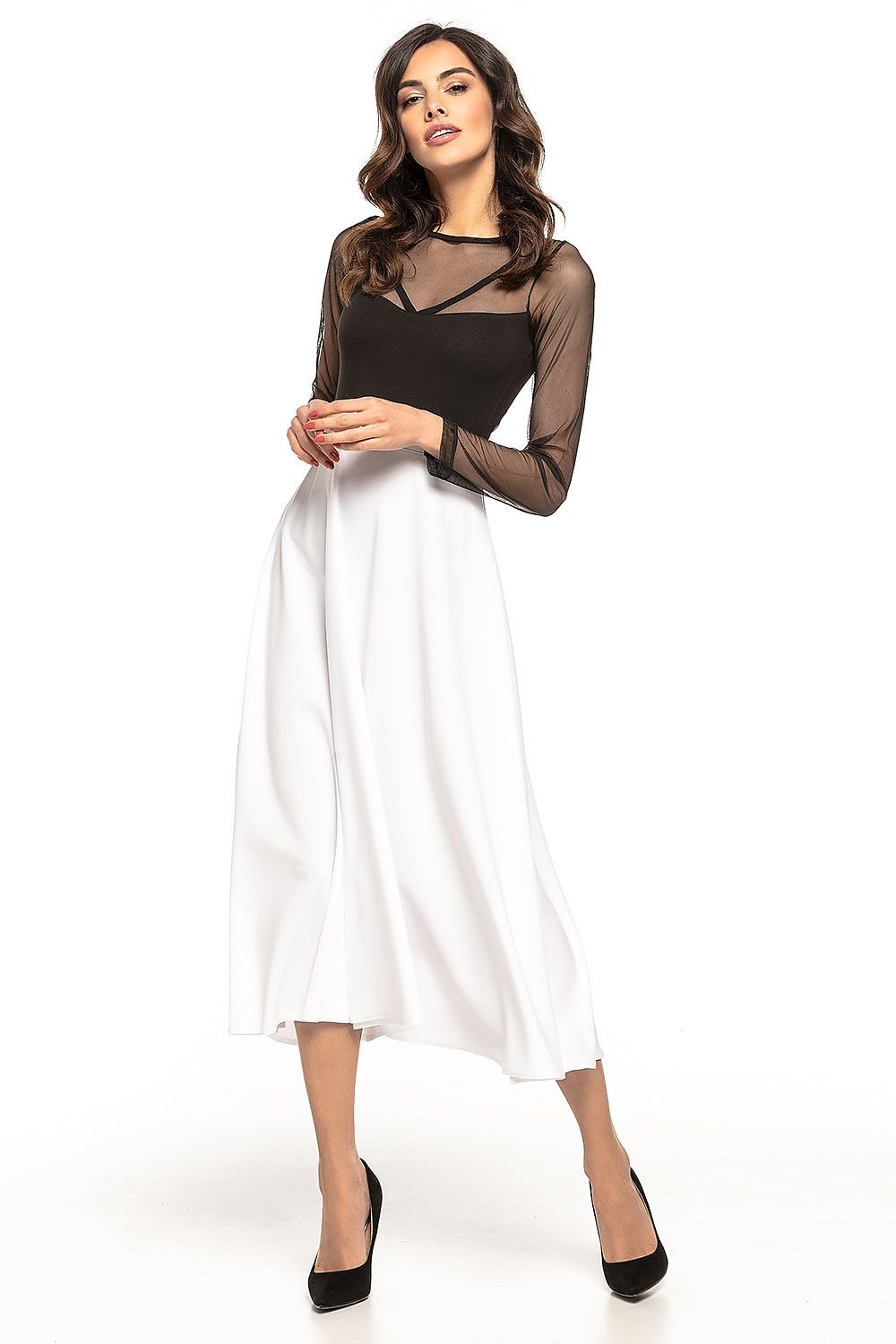 Jupe midi blanche style années 50 pour un look rétro élégant idéal pour des occasions spéciales ou une tenue de soirée chic.