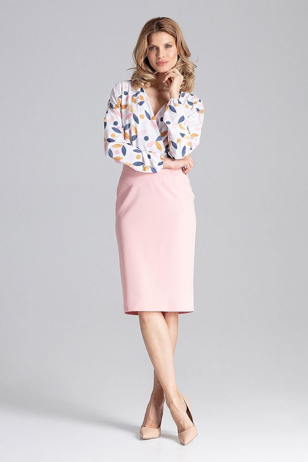 Jupe crayon rose midi élégante pour travail ou sortie, coupe classique et féminine, matière confortable.